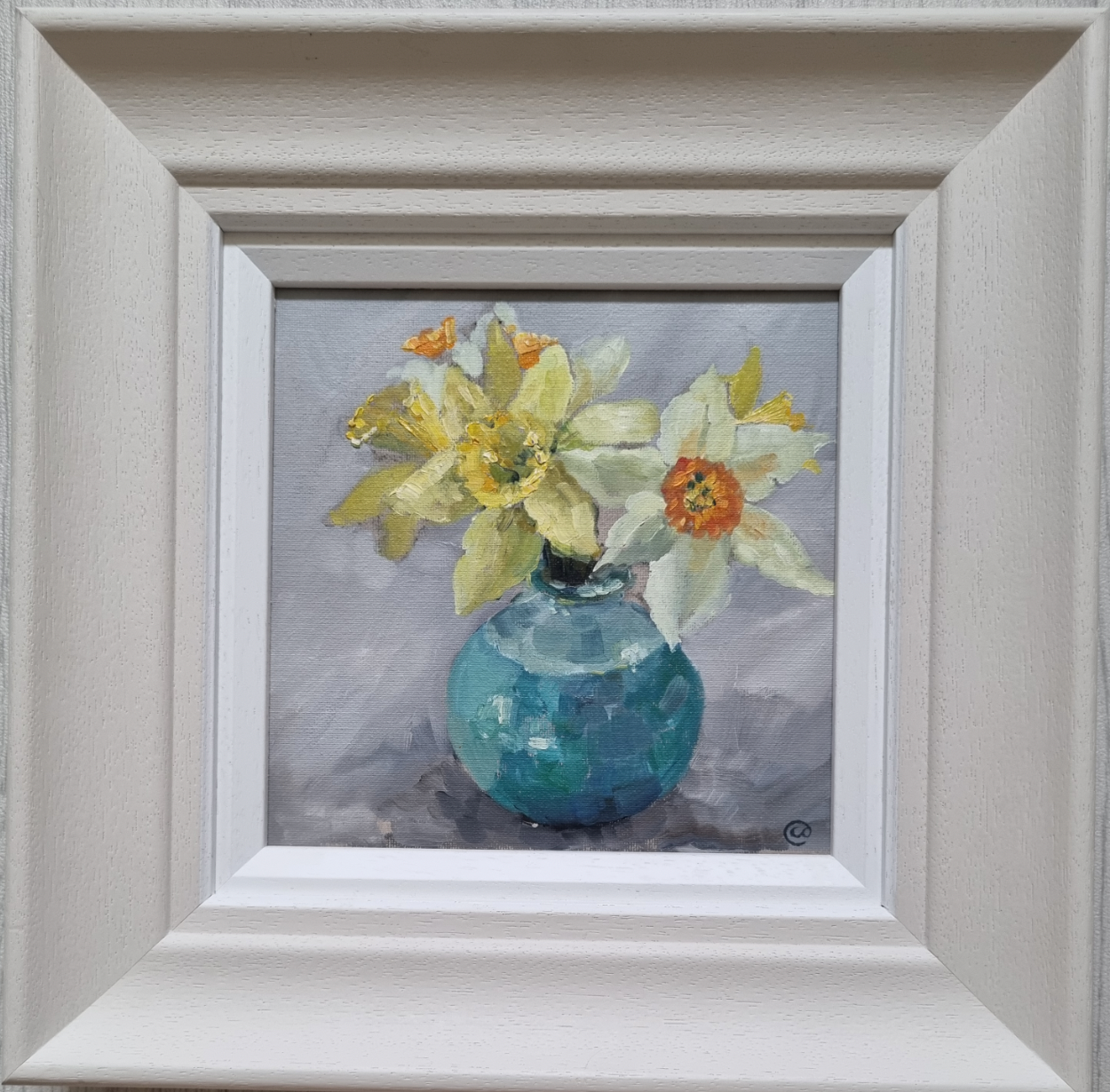 Daffodils in a blue vase