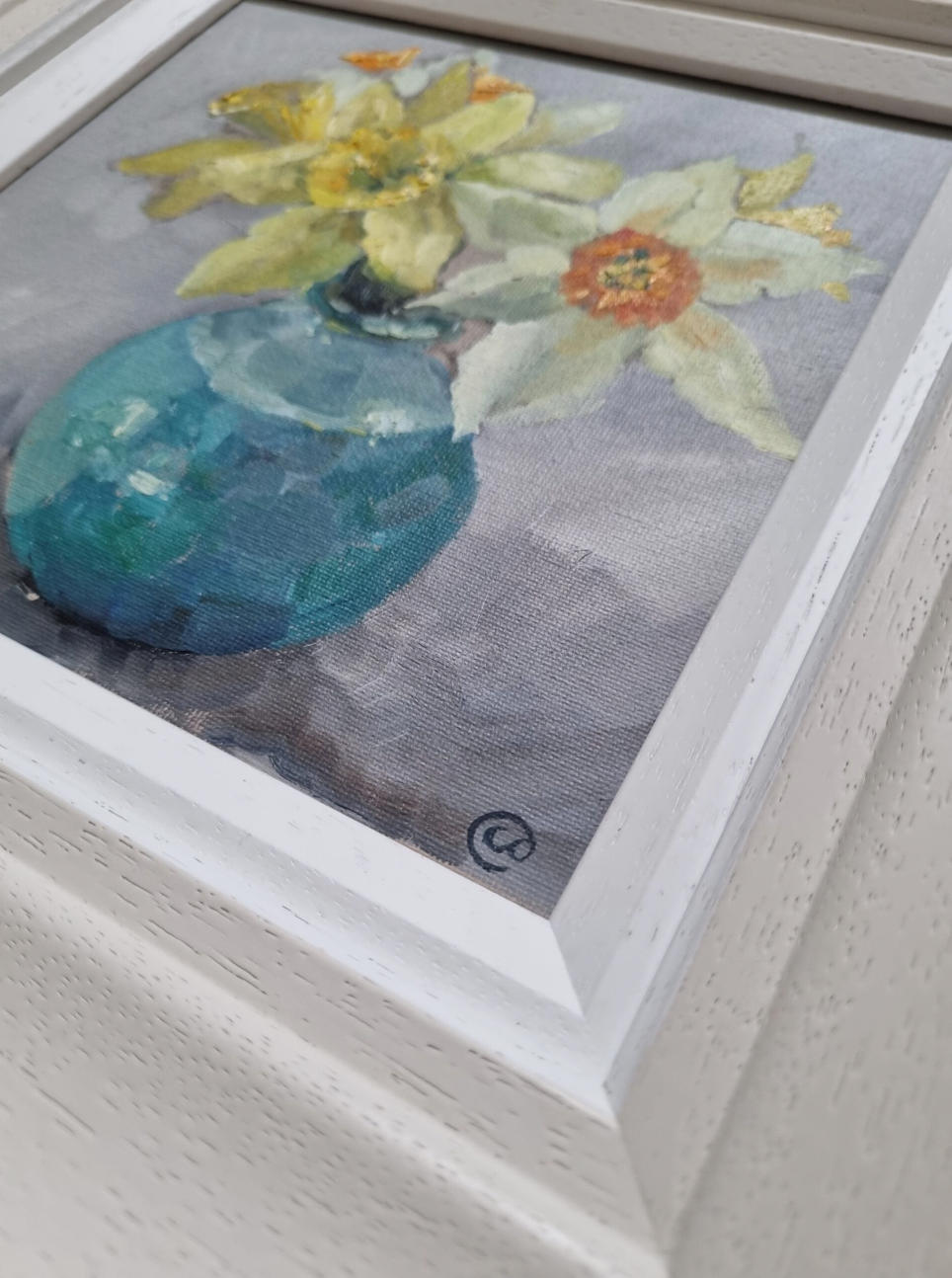 Daffodils in a blue vase