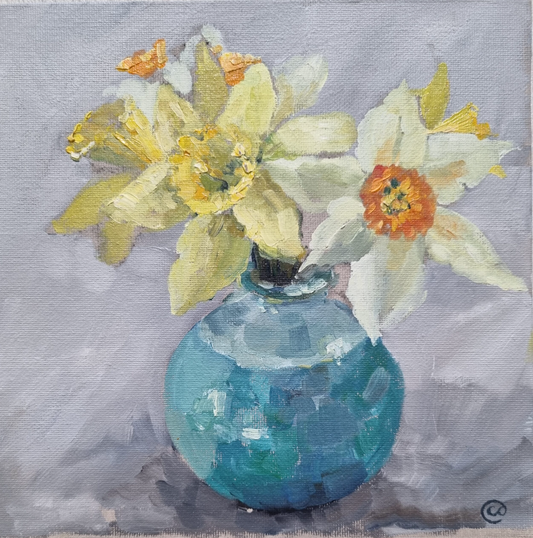 Daffodils in a blue vase