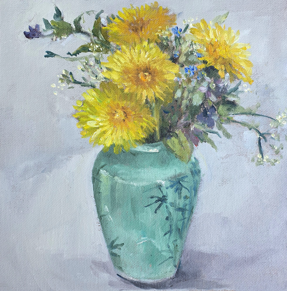 Dandelions in a green vase